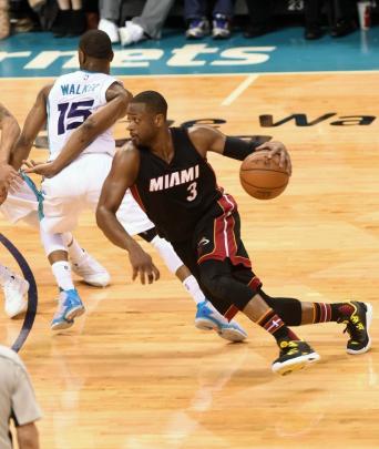 Miami Heat guard Dwyane Wade drives to the hoop. Photo: Reuters