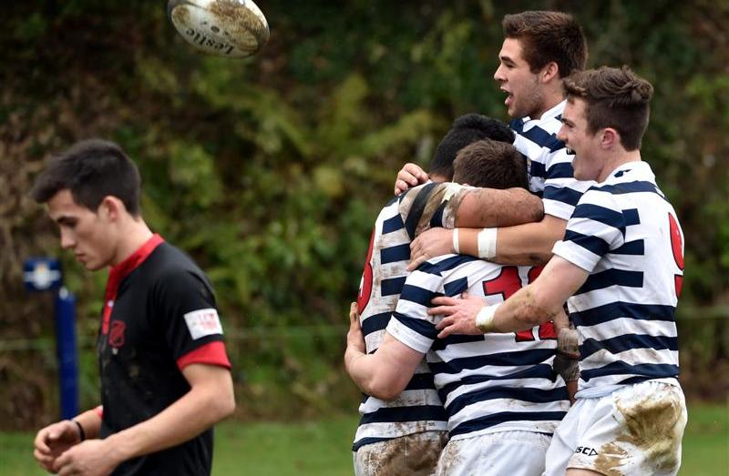 Otago Boys' High School First XV players celebrate winning the South Island title last year...