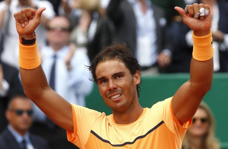 Rafael Nadal celebrates after winning. Photo: Reuters