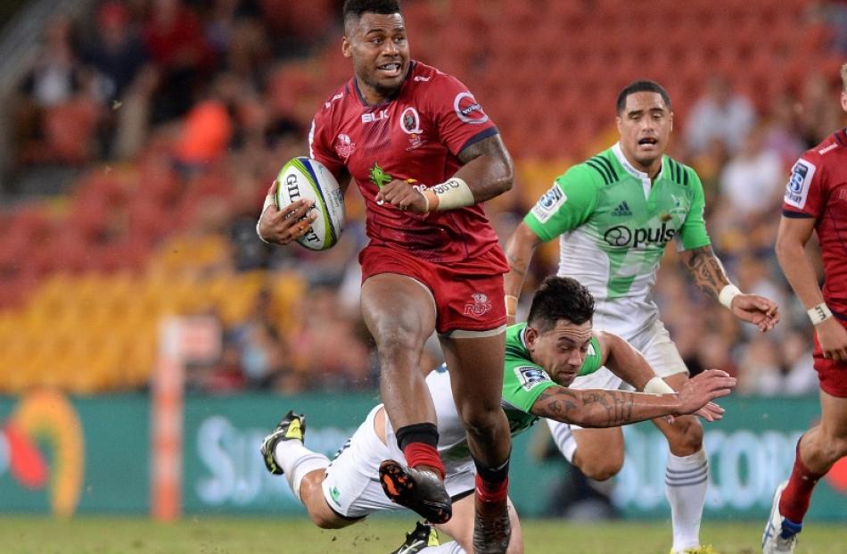 Samu Kerevi makes a break for the Reds in their win over the Highlanders. Photo: Getty Images