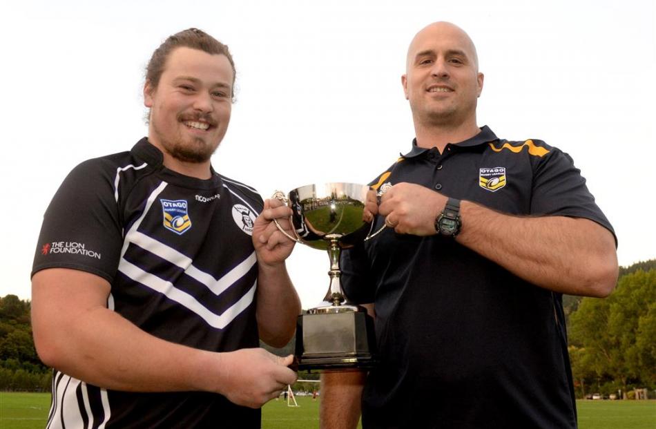 South Pacific Raiders captain Sam Brame (left) and Otago Rugby League chairman Ian Blake with the...
