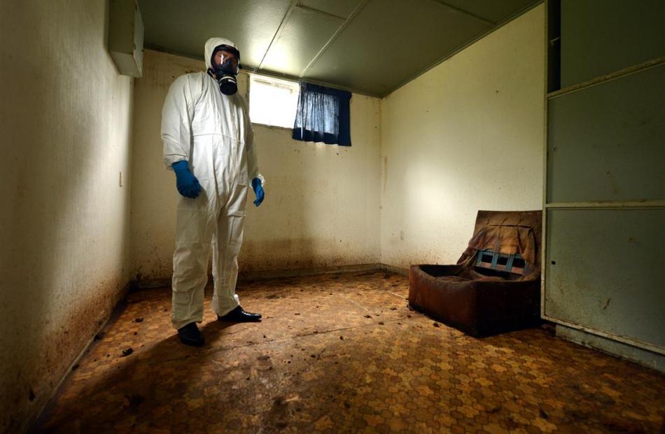 Specialist cleaner David Begg, of Pure Services, assesses a rural house where animal faecal...