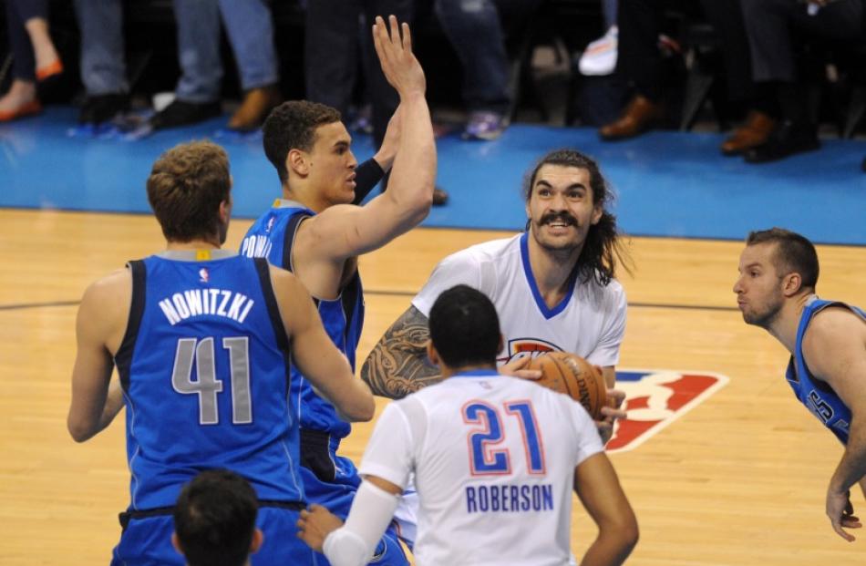 Steven Adams takes the ball to the hoop for the Oklahoma City Thunder during their win over the...