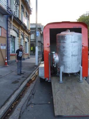 Winemaker Brendan Seal moves winemaking equipment into the former Gresham Hotel. Photos supplied.