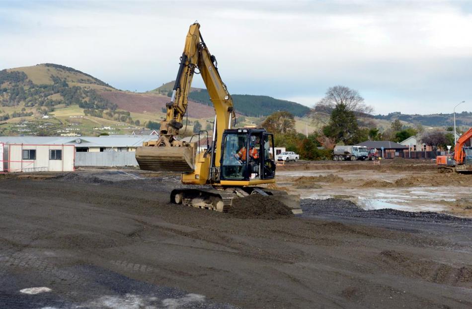 Contractors excavate the site of the new Countdown supermarket in Gordon Rd, Mosgiel. Photo by...
