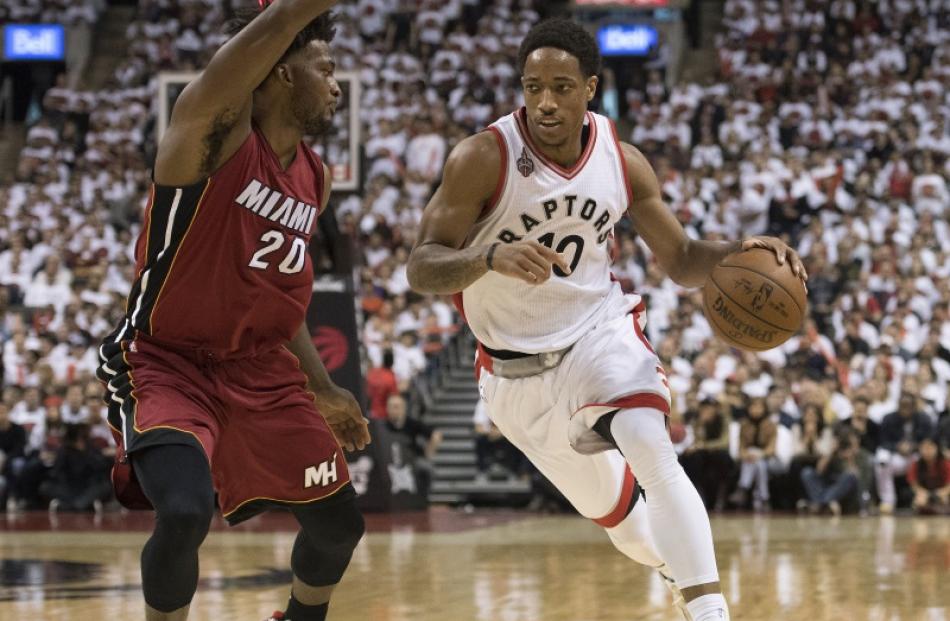 DeMar DeRozan drives to the hoop as Justise Winslow tries to defend him. Photo: Reuters