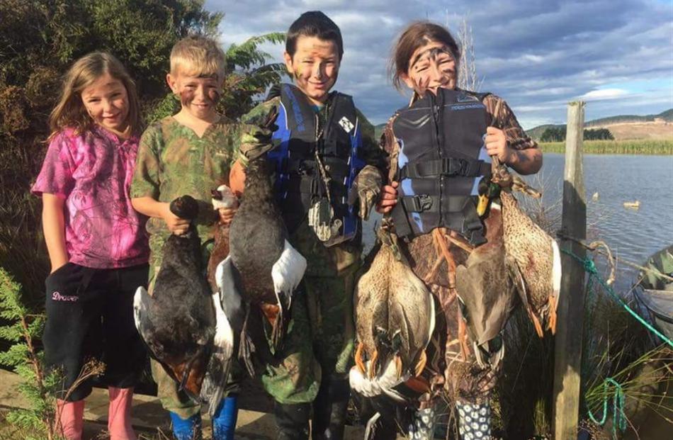 Duck shooting was a family affair at Lake Waipori on the opening day of the season. Showing off...