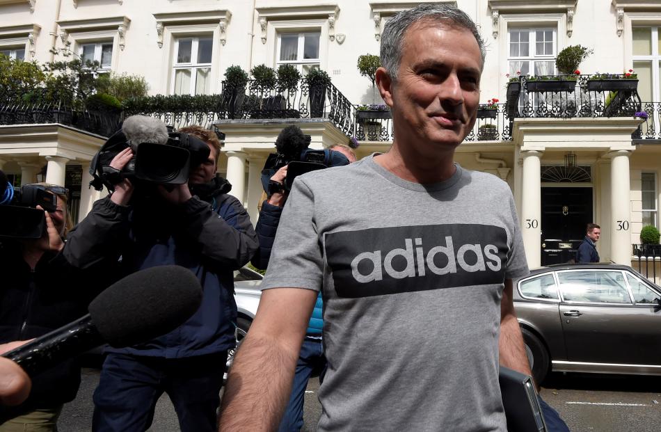Jose Mourinho leaves his home in London. Photo: Reuters