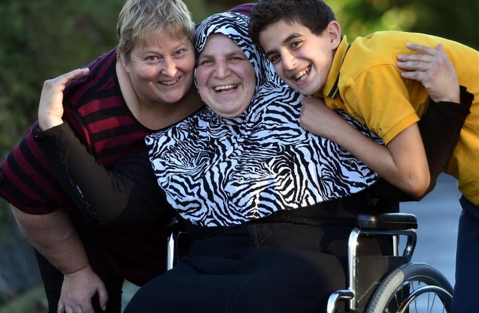 Red Cross volunteer Lynette Will (left) with her new-found Syrian refugee friends Wafaa Al Ashram...