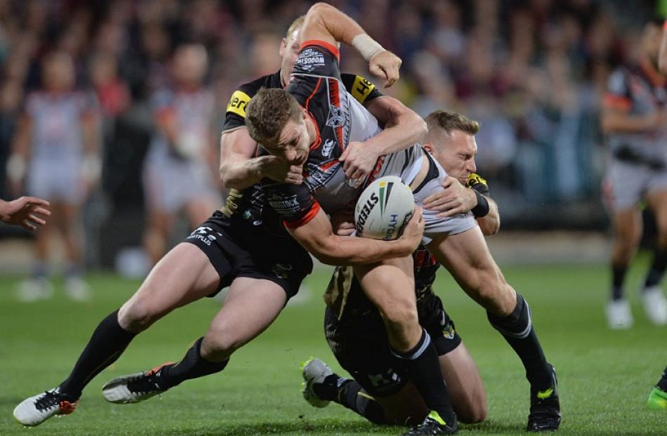 Ryan Hoffman is tackled during the Warriors' loss. Photo: Getty Images