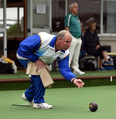 Taieri Bowling Club member Lawrie Watson plays in the 25th Anzac Day bowls tournament at Mosgiel....