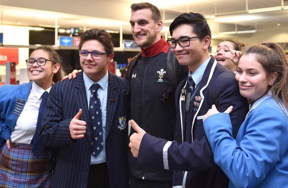 Pupils of King’s and Queen’s High Schools  and a prince of Welsh rugby pose for a picture  at...