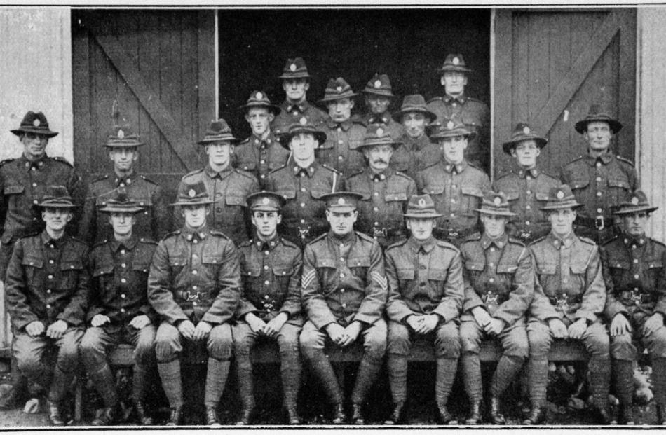 A group of Dunedin men in the Sixteenth Reinforcements in camp at Trentham. Front row (from left)...
