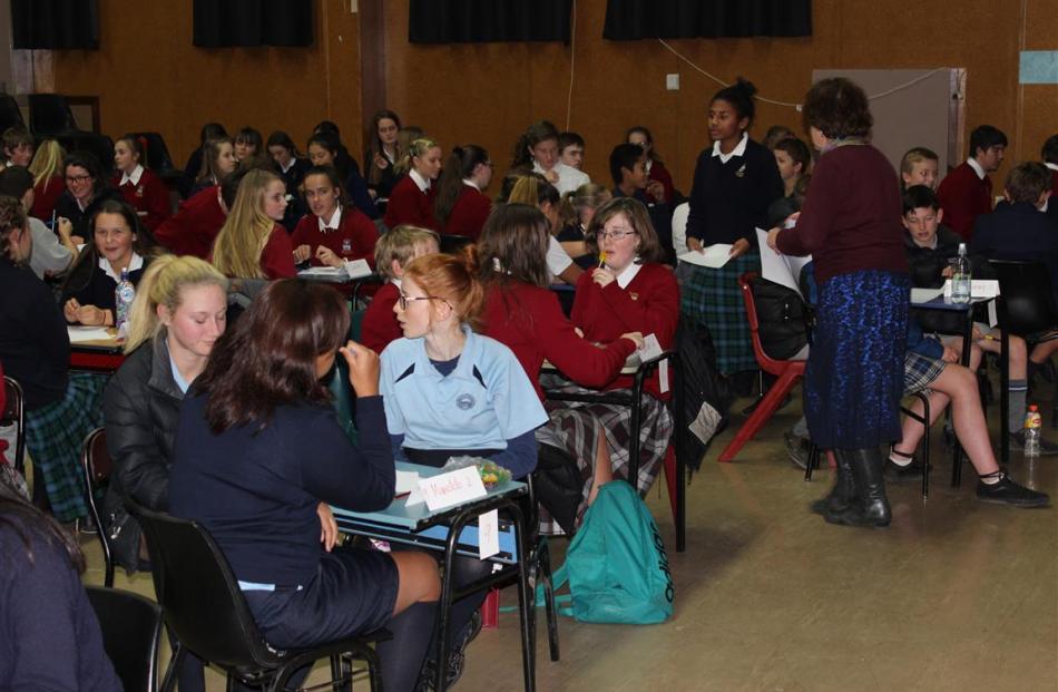 Bright young minds prepare to tackle the Otago Daily Times Extra! spelling quiz at Cromwell...