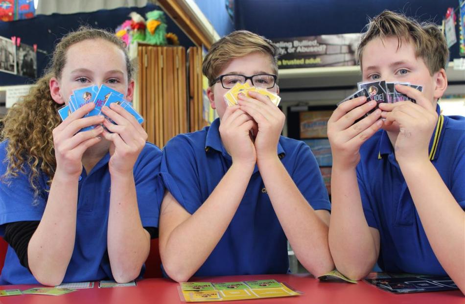 Clyde Primary School pupils Grace Tohill, Christopher Nevill and Liam King (all 12) test Sticks ...