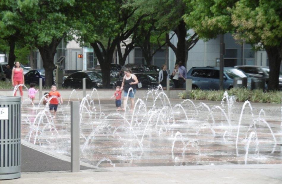 Discovery Green has a lake, playground, fountains, art and restaurants. Photos: Dame Elizabeth...