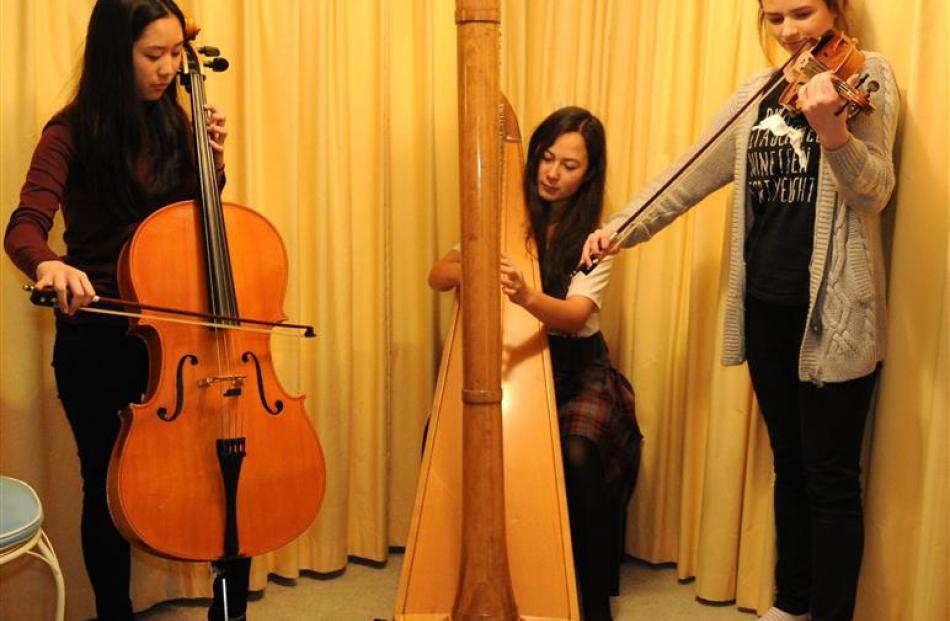 Logan Park High School trio Ball of Confusion, (from left) Pun Leelaket (cello), Rikke Kikkawa...