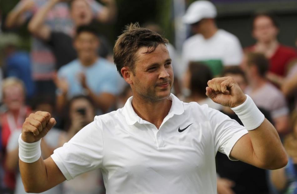 Marcus Willis celebrates after winning Wimbledon. Photo: Reuters