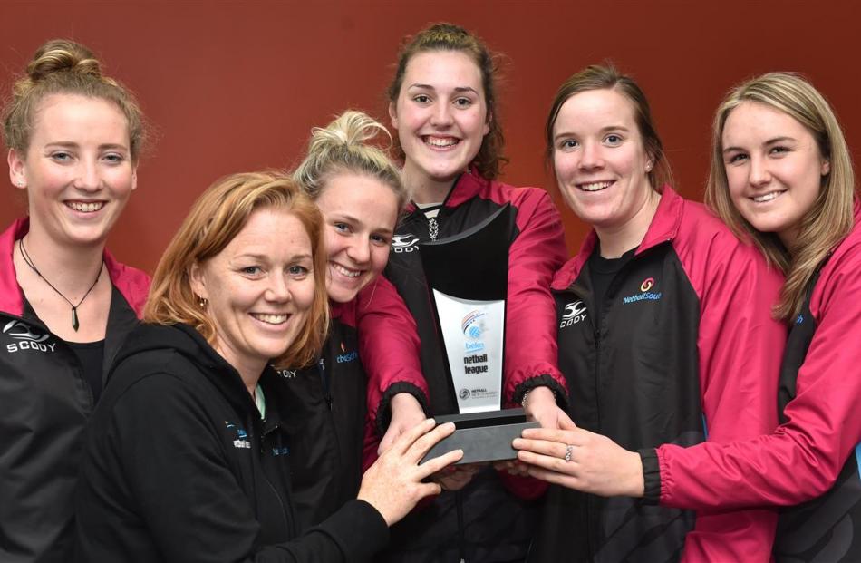 Netball South coach Lauren Piebenga (second from left) with South players (from left) Bridget...