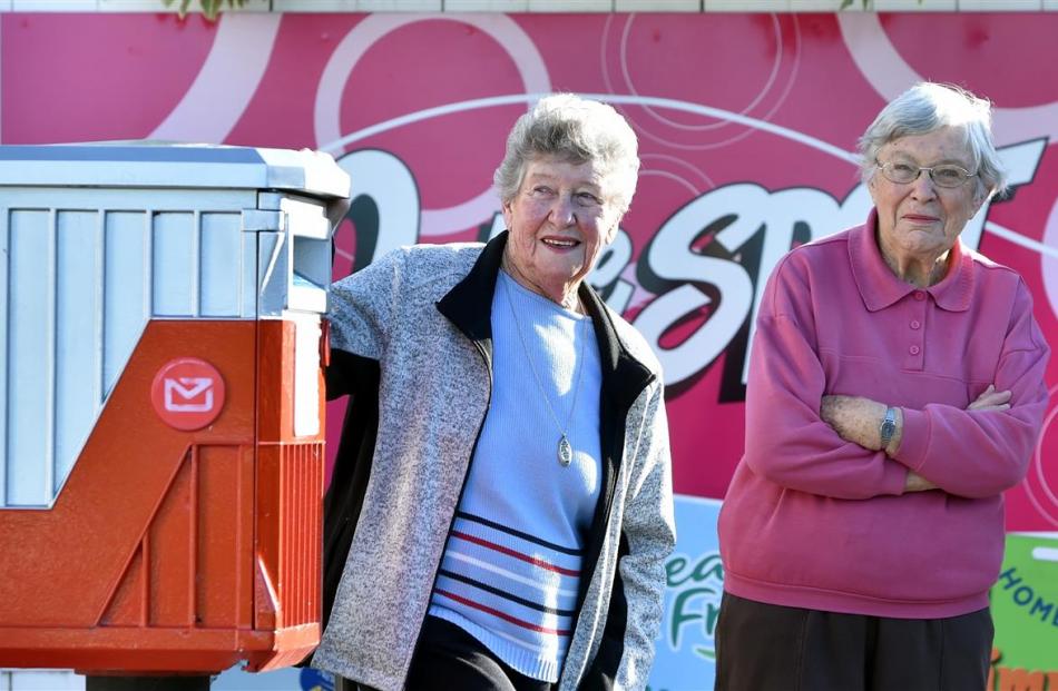 Phyl Beagley (left) and Gaynor Earl will keep fighting to save the 465 Taieri Rd postbox. Photo...
