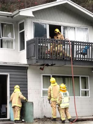 Queenstown firefighters attend the blaze. Photo by David Williams.