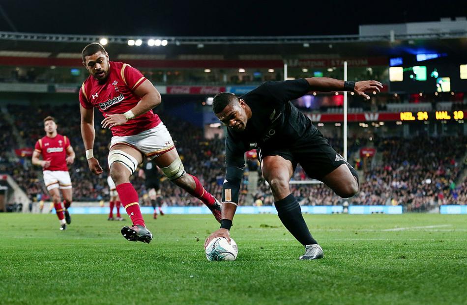 Waisake Naholo scores in the corner for the All Blacks. Photo: Getty Images