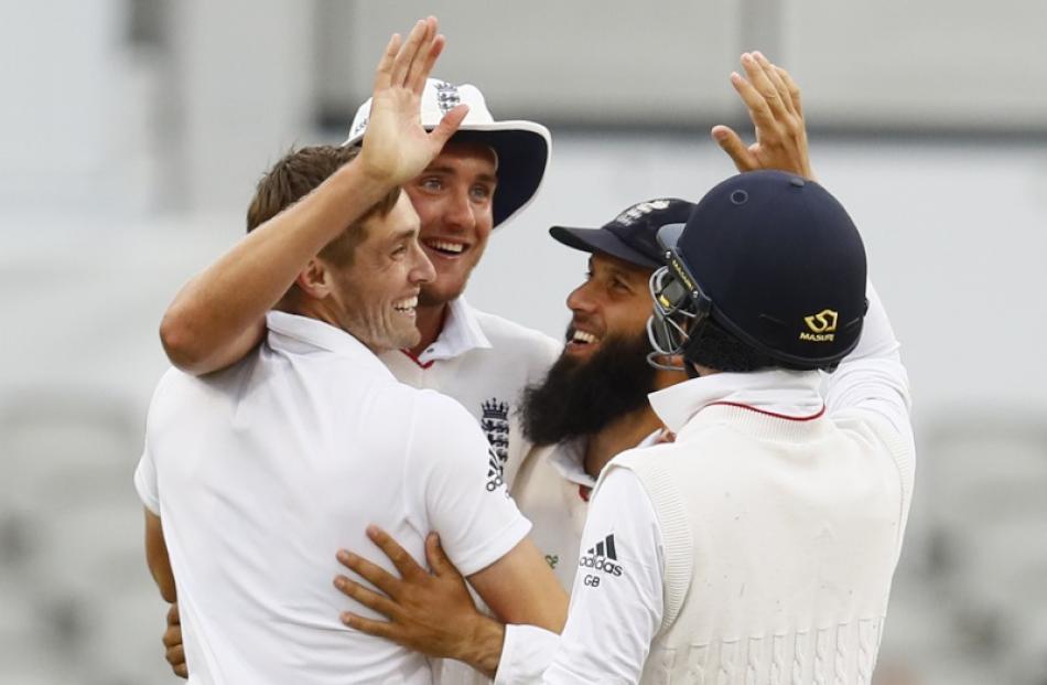 England players celebrate after beating Pakistan. Photo: Reuters