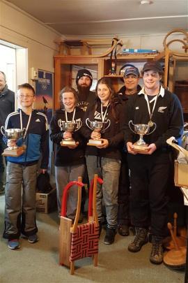 This season's national champions (front, from left) junior men: James Schollum (12), of Dunedin;...