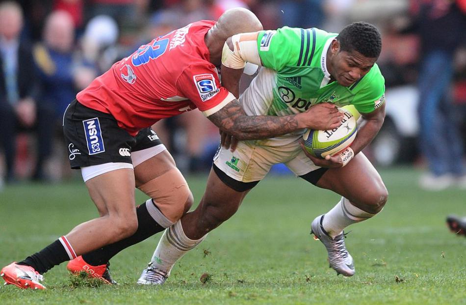 Waisake Naholo tries to break a tackle for the Highlanders against the Lions. Photo: Getty Images