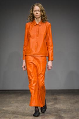 An all orange leather ensemble as seen at  Stockholm Fashion Week 
