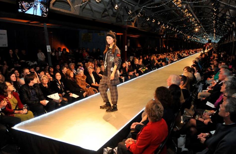A model in Nom*D poses at the end of the catwalk at the beginning of last night's 15th...