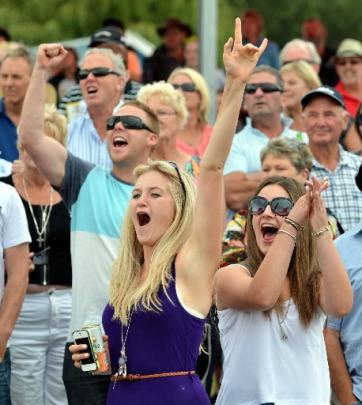 Celebrating their win during the Omakau Races yesterday are (from left) Quinton Wicks (27), of...