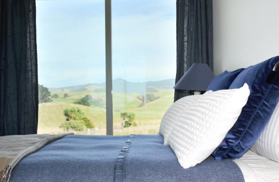 The main bedroom has rural views on one side and ocean views on the other.