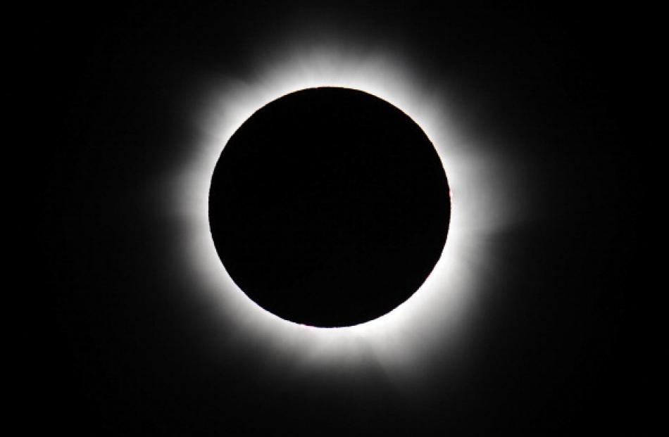 Thousands of eclipse-watchers have gathered in part of North Queensland to enjoy the solar...