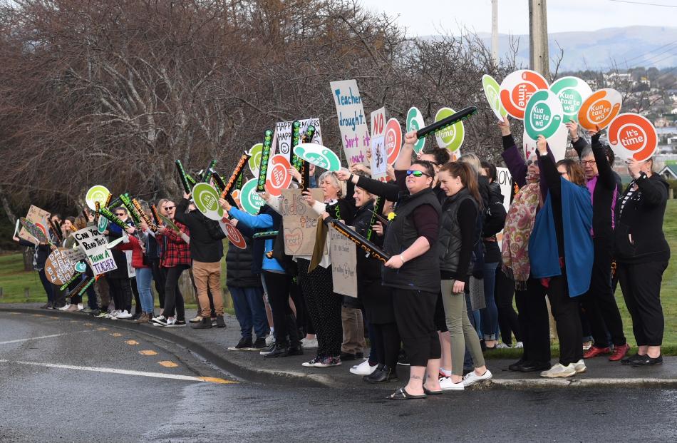 Striking South Otago NZEI members interact with SH1 motorists at Balclutha. Photo: Stephen Jaquiery 