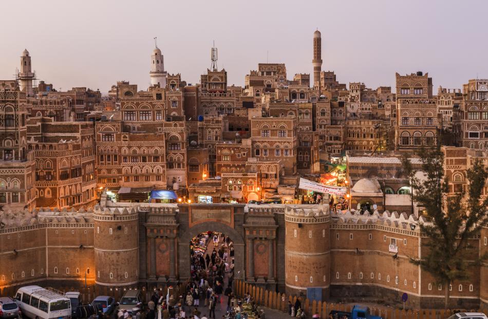 The Yemen gate and the old city of Sana'a at night. Photo: Getty Images