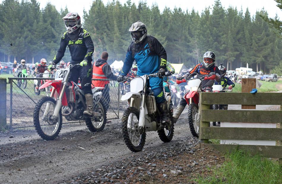 The first wave of more than 900 off road motorcycle riders head away at the start on the16th annual Lakes to Sea trail ride for off road bikes and ATVs at Milton. Photo: John Cosgrove