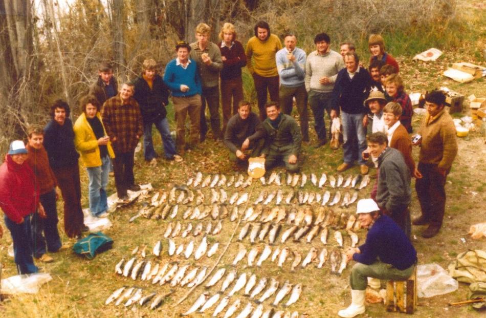 Fishermen pictured at the Red Bridge show off many of the 136 fish caught during the 1976...