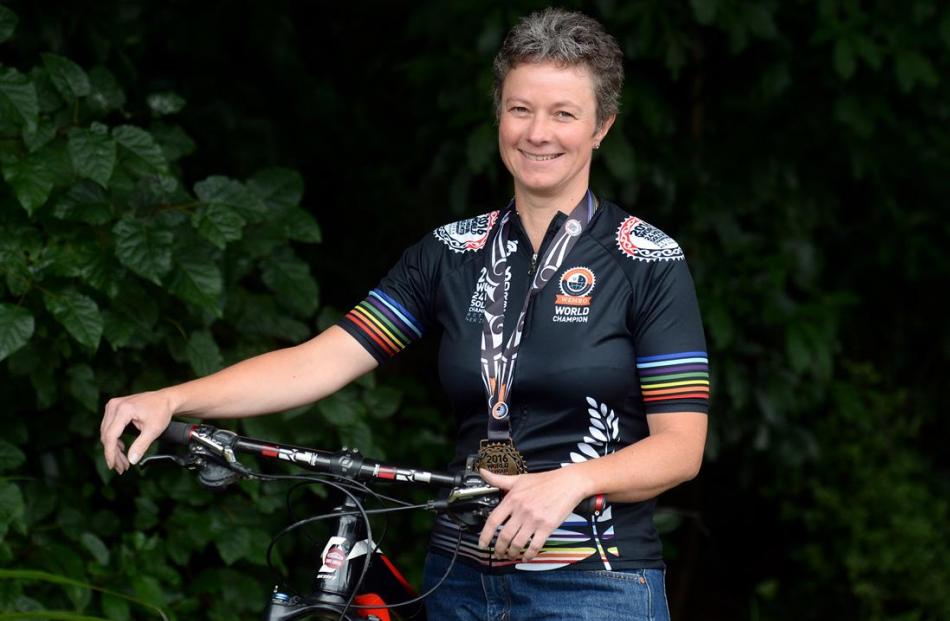 Mountain biker Ronel Cook and her bike combined to win a national title. Photo by Linda Robertson.