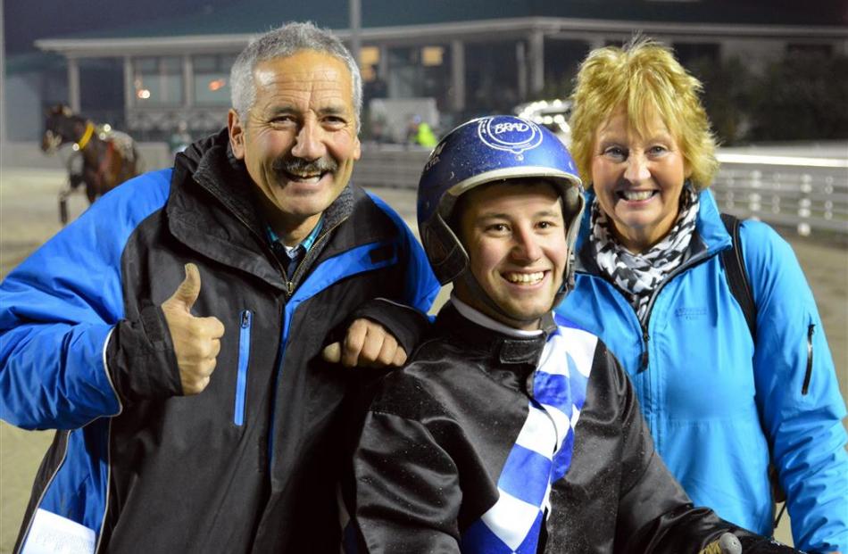 Phil Williamson (left) with son Brad and wife Bev after Winners Shout gave Williamson his 50th...