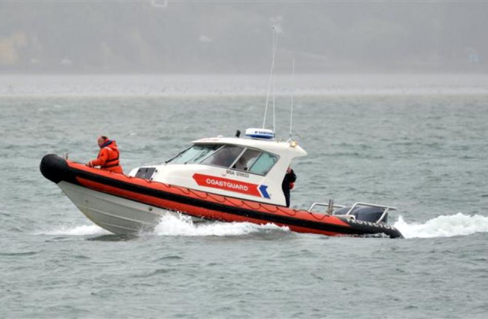 The Coastguard searches for a kayaker at Back Beach in Port Chalmers yesterday. Photo by Gerard O...