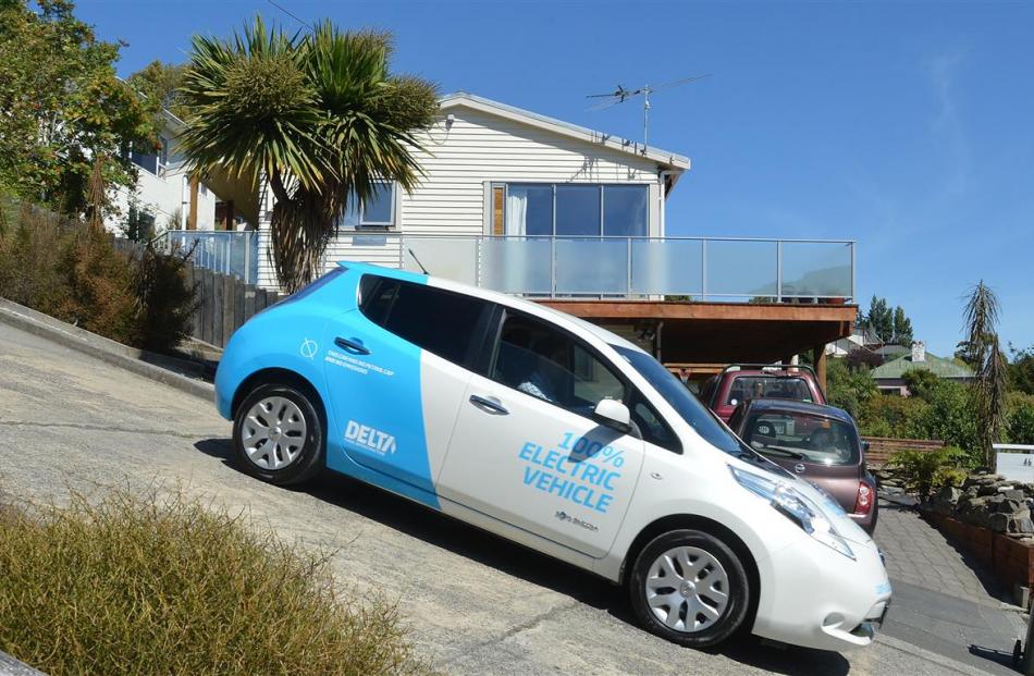ODT reporter Damian George drives a 2014 Nissan Leaf electric vehicle down Baldwin St, Dunedin....