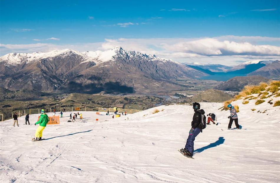Skiers and snowboarders enjoy the season’s first day at Coronet Peak. Photos by Chris Hoopman/NZSki.