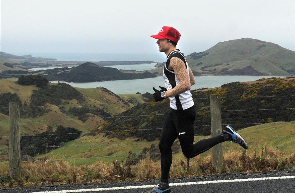 Ken McDonald, of Caversham, gets a nice view on the Peninsula Relay on Saturday. Photos by...