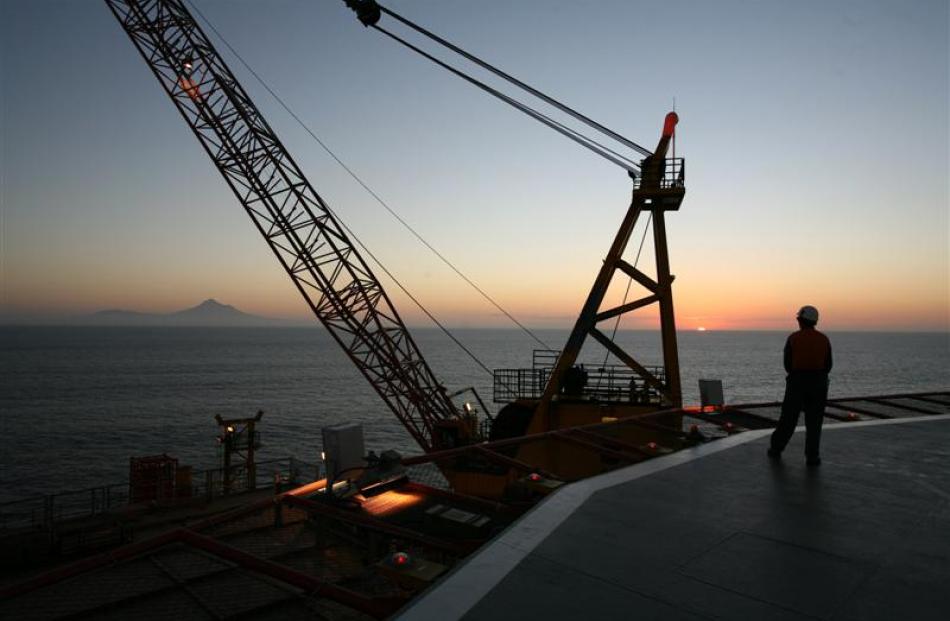 The hardware of the Taranaki oil and gas industry, offshore rigs and onshore processing stations.