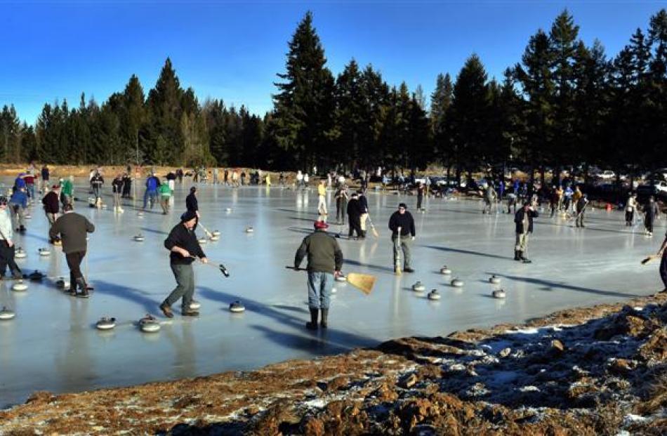 Curlers in action at the  national bonspiel  in Naseby  yesterday. Photos by Peter McIntosh.