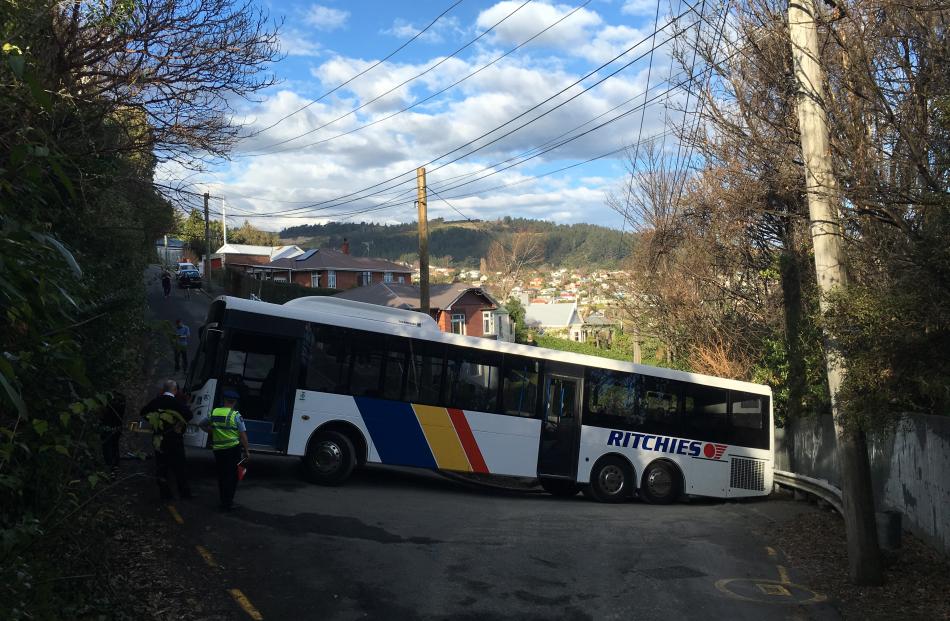 The bus is stuck fast in Buccleugh St. Photo by Craig Baxter