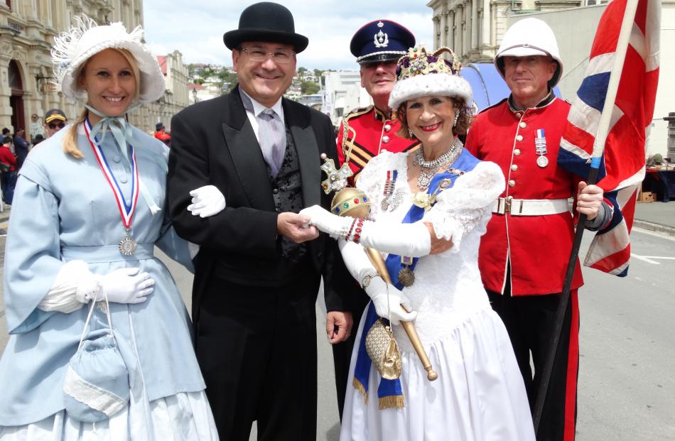 Nicole and Guenther Sumann, of Altach, Austria, are awarded the runner-up medal for best dressed...