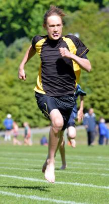 Nico Bowering (13), mt Aspiring College competes in the 100m sprint during the Otago prmary...