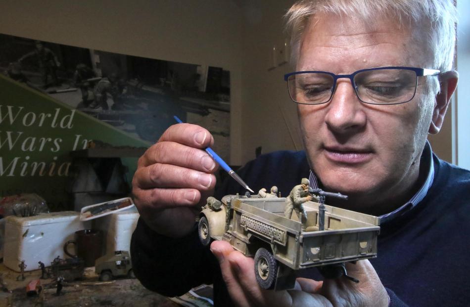 Jeff Cotton working on his scale model of a World War 2 Long Range Desert Group Chevrolet truck...